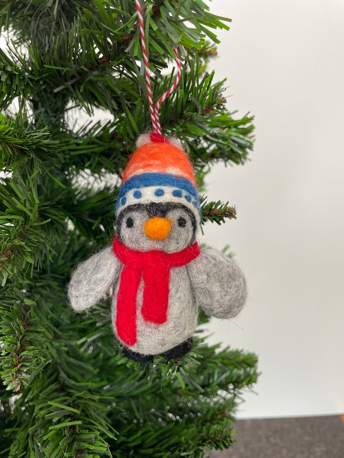 100% wool felt Penguin with cosy hat and scarf Christmas decoration