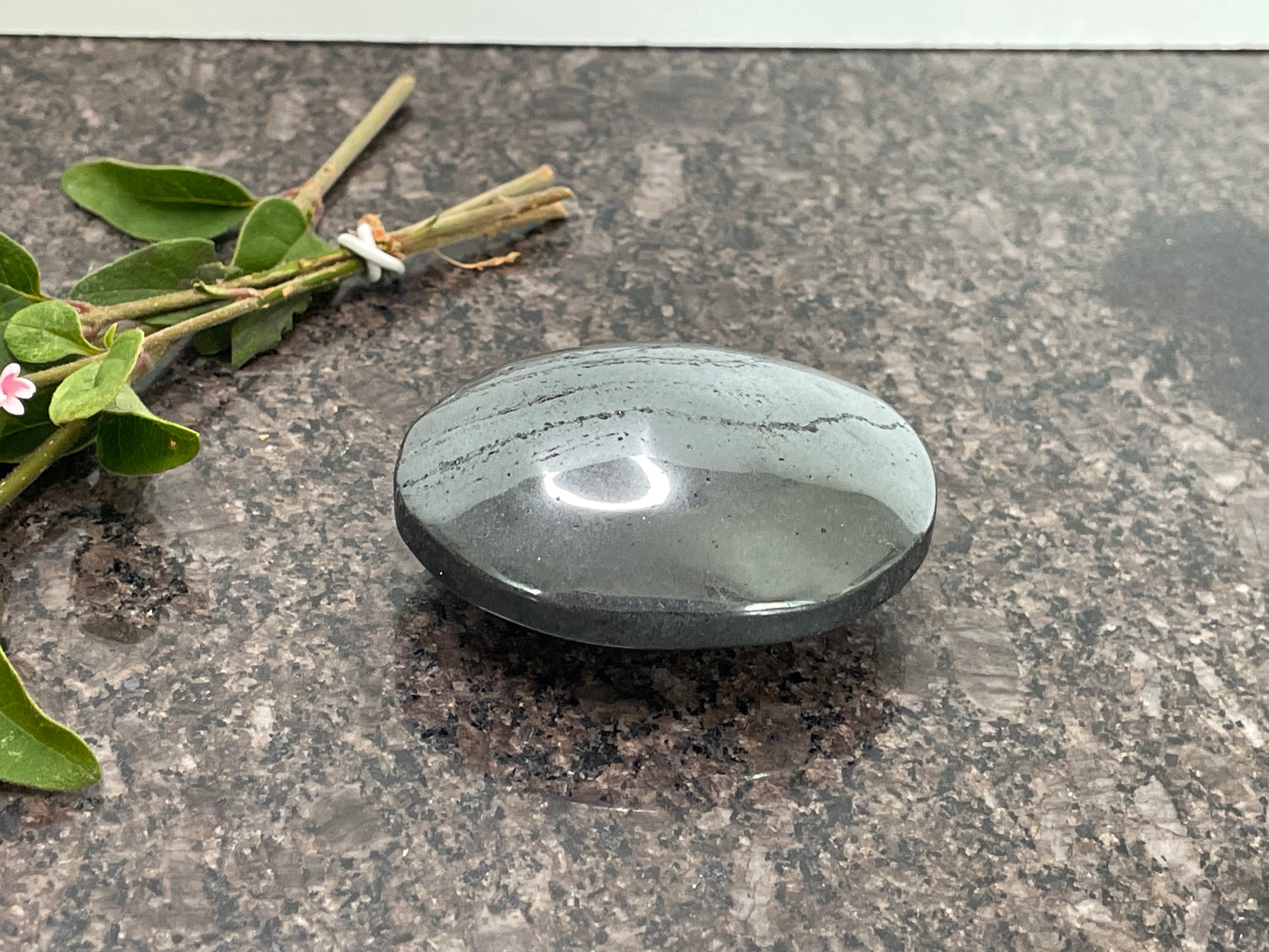 Hematite Palm Stone - spiritual healing crystal