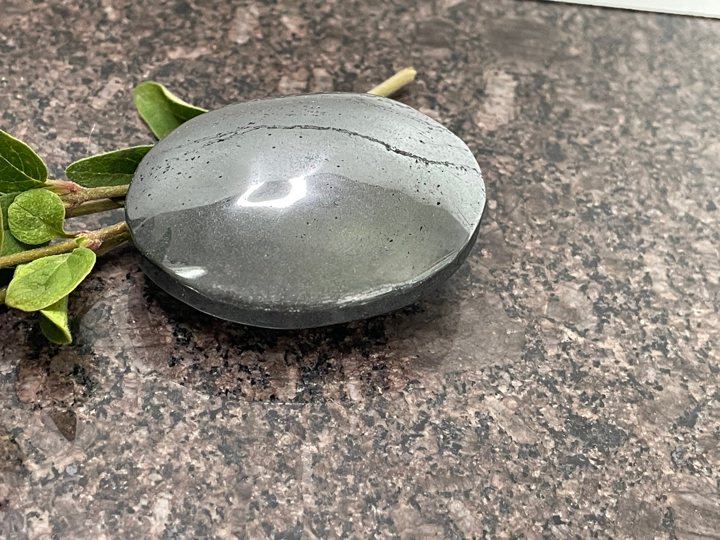 Hematite Palm Stone - spiritual healing crystal