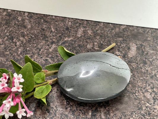 Hematite Palm Stone - spiritual healing crystal