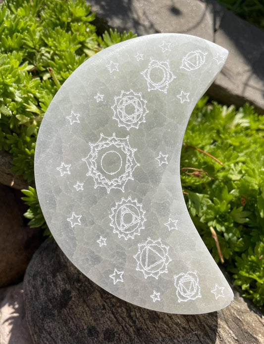 Etched Selenite Crystal Plate in the shape of a crescent moon.