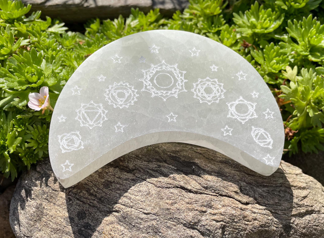 Etched Selenite Crystal Plate in the shape of a crescent moon.